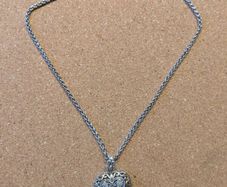 Silver necklace with locket pendant heart