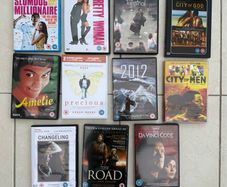 DVD bundle containing Precious, The Da Vinci code, Changeling, The road, City of God, City of Men, The terminal, Slumdog millionaire, Pretty Woman, 2012 and Amelie