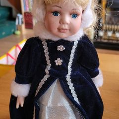 Porcelain doll - Avon collection