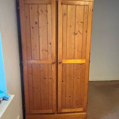 Pine wooden wardrobe. Both side hanging. Drawer underneath.