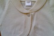 Light cream cardigan.  Age 7-8