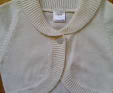 Light cream cardigan.  Age 7-8