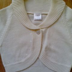 Light cream cardigan.  Age 7-8