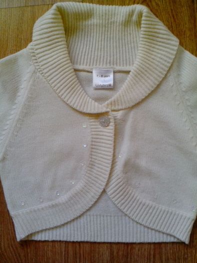 Light cream cardigan.  Age 7-8