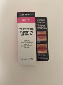 The inkey list tripeptide plumping lip balm in shade pink tint