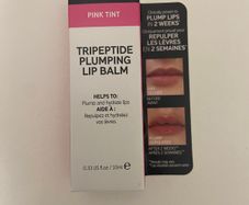 The inkey list tripeptide plumping lip balm in shade pink tint