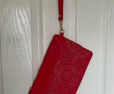 Never used  Red/ dark orange colour with gold beads and silver glitter details