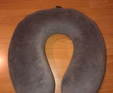 Grey travel cushion