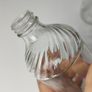 328 - Set of 2 Vintage Clear Glass Collectible Decorative Swirls Bottles Image 3