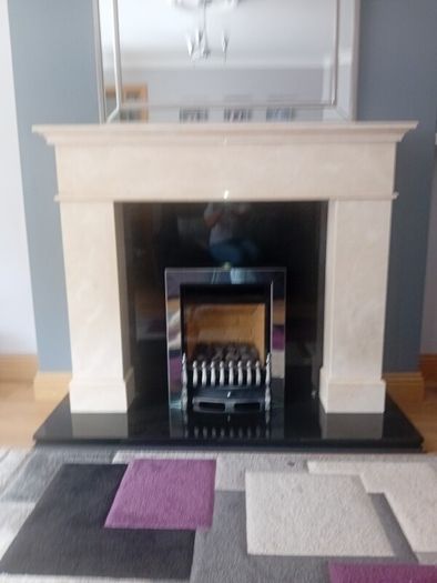 marble fire place  ready to be collected .