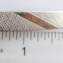 Gold plated tie clip with textured detail Image 10