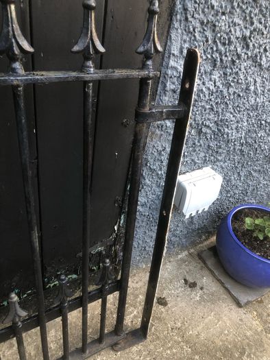 Set of wrought iron driveway gates and side gate