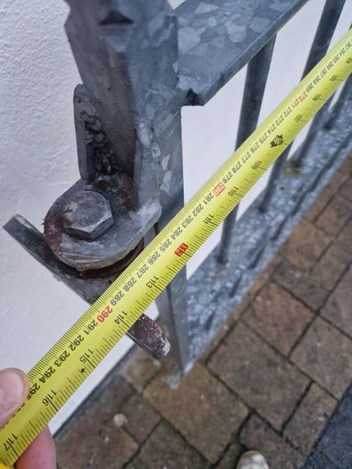 Decorative galvanised double steel gates.