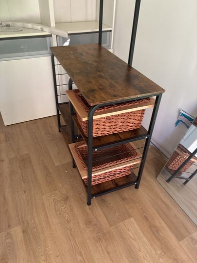 Handy n kitchen or bathroom unit.