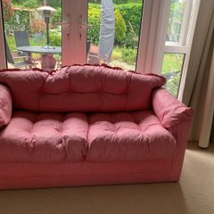A pretty pink sofa bed, ideal for sleepovers in a girls bedroom. Very good condition