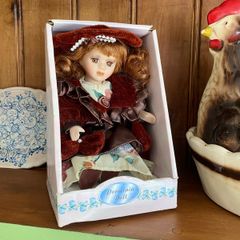 Vintage Porcelain Doll in Original Packaging