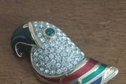 Beautiful vintage parrot brooch covered with rhinestones with enamel accents.