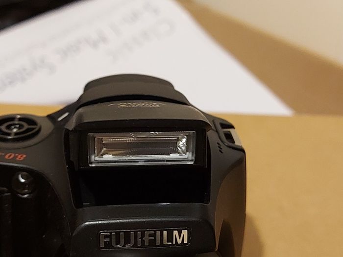 Fujifilm FinePix S5800 Digital Camera, Takes 4 AA Batteries, not powering on, for parts or repair