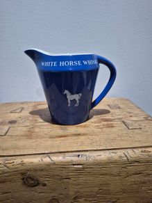 White Horse ceramic advertising whiskey Jug.
