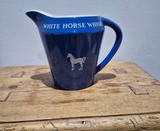 White Horse ceramic advertising whiskey Jug.