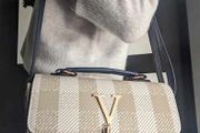 A well-made small handbag - BRAND NEW