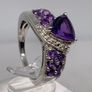 A beautiful silver ring with amethysts. Image 2