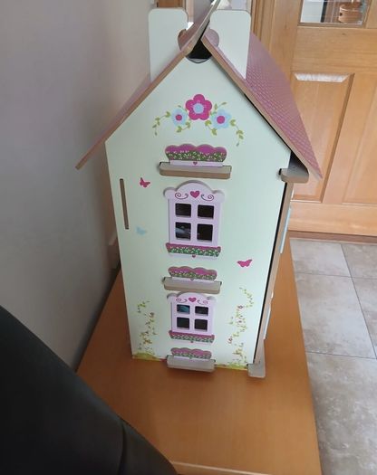 Large wooden dolls house