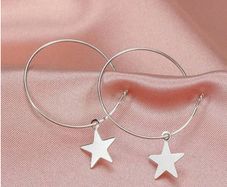 Silver earrings with star charms
