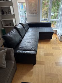 IKEA Friheten Leather corner sofa with ottoman