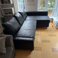 IKEA Friheten Leather corner sofa with ottoman