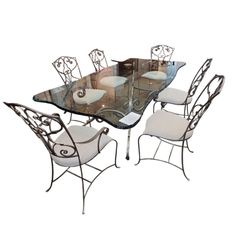 Classy solid glass dining table and 8 chairs