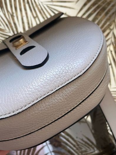 Coccinelle saddle bag . Great condition
