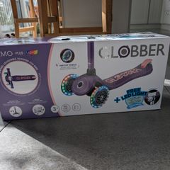 3 wheels scooter for kids with wheels light and front light. New in box!