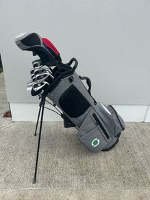 Golf clubs, bag, trolley