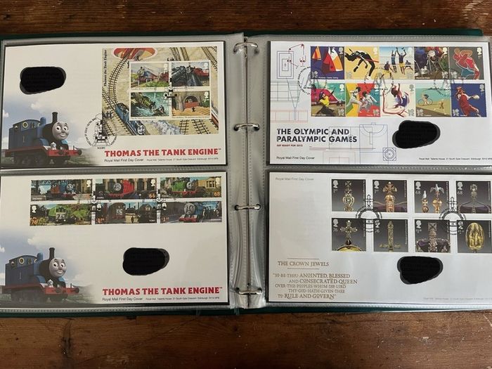 Collection of  77 UK First Day Cover stamps 2010 to 2013 in album
