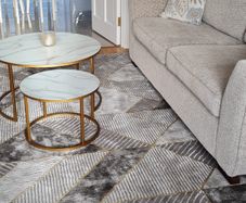 Set of 2 marble-effect gold nesting coffee tables  good condition