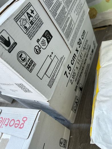 3 boxes tiles and adhesive