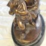 Bronzed Winged Cherub putto open seashell or leaf-shaped vessel with a scorpion like tail. Image 3