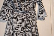 Perfect for Summer. black Zebra Print Wrap Tea Dress from Pretty Little Thing