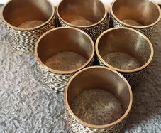 six brass napkin ring's
