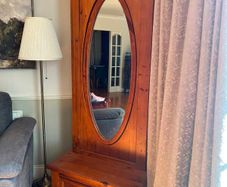 Pine hall stand with oval mirror and drawer