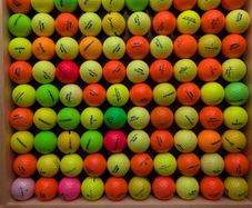 Coloured golf balls