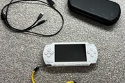 Modded Sony White PSP 1000 with Over 100 Games with Case and Charger.