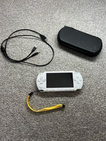 Modded Sony White PSP 1000 with Over 100 Games with Case and Charger.