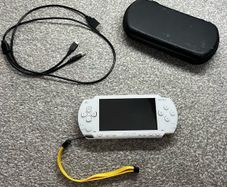 Modded Sony White PSP 1000 with Over 100 Games with Case and Charger.