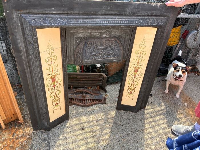 Antique Victorian fireplace with a modern pine mantle