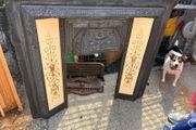 Antique Victorian fireplace with a modern pine mantle