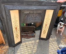 Antique Victorian fireplace with a modern pine mantle
