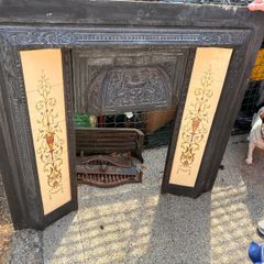 Antique Victorian fireplace with a modern pine mantle