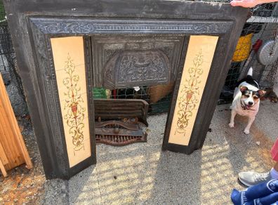 Antique Victorian fireplace with a modern pine mantle